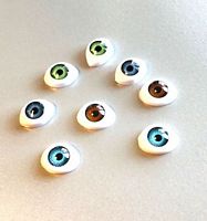 Poppen ogen ovaal 13 mm iris 7 mm kleur bruin nog 3 leverbaar